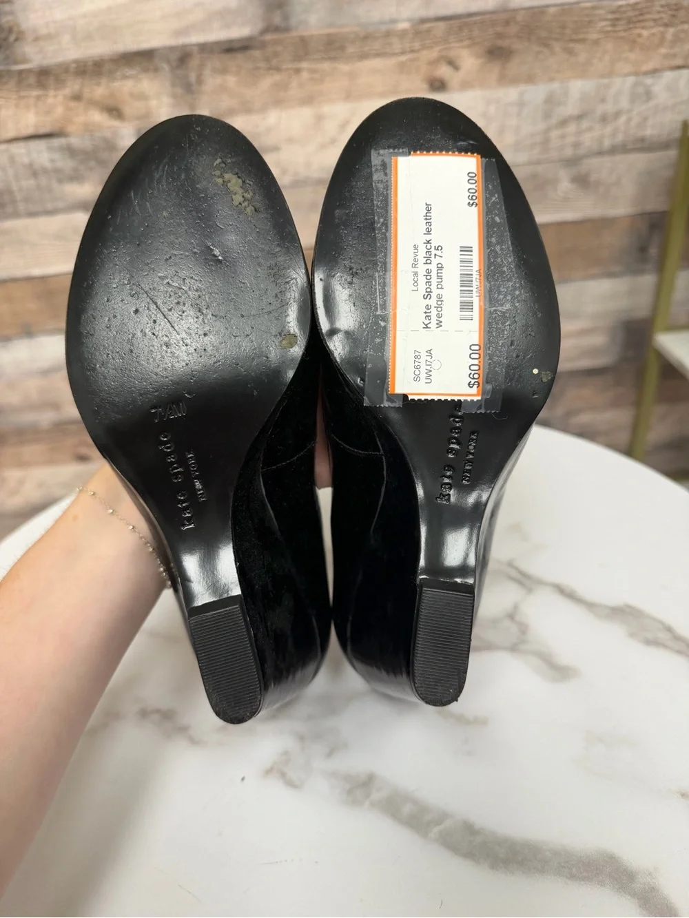 Kate Spade black leather wedge pump 7.5